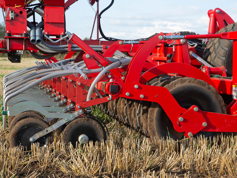 Close-up of a HE-VA Accu-Disc double disc coulter mounted to the rear of a HE-VA Evolution