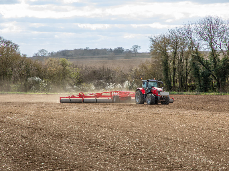 16.3m HE-VA King Roller Cambridge roll behind an Massey Ferguson tractor, in field