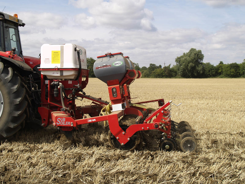 Side image of a HE-VA Accu-Disc drilling on the back of a HE-VA Subsoiler