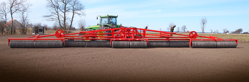 HE-VA King Roller behind John Deere tractor