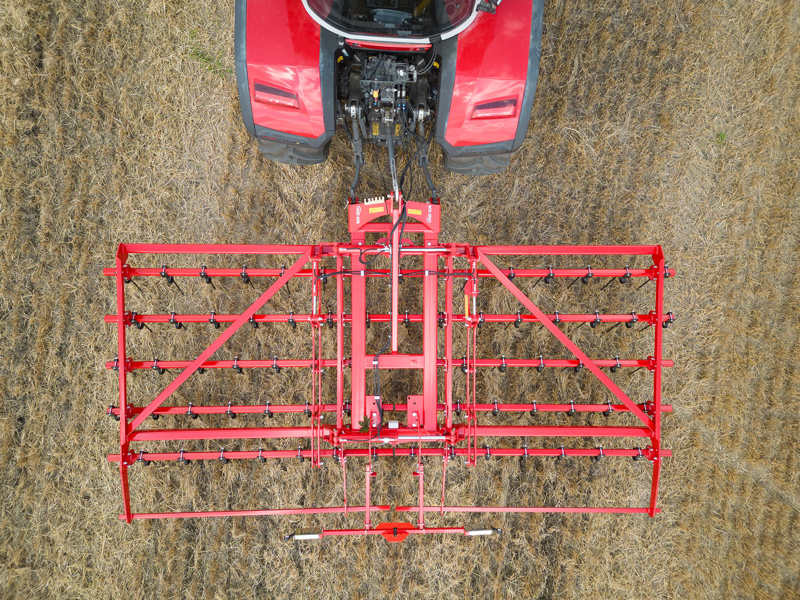 Above view of 6m HE-VA Top Strigle straw harrow in working position
