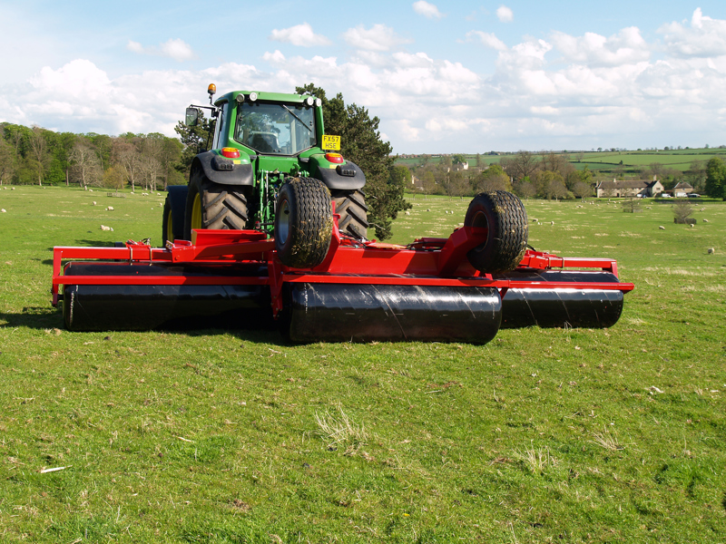 HE-VA Grass Roller pictured in front of farmhouse