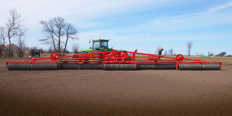 HE-VA King Roller behind John Deere tractor